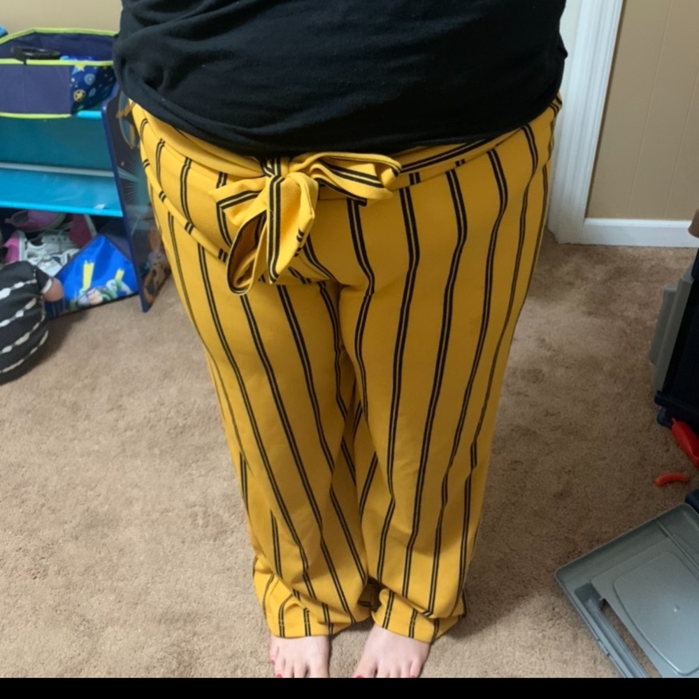 Like an angel  yellow with navy blue pinstripe pants